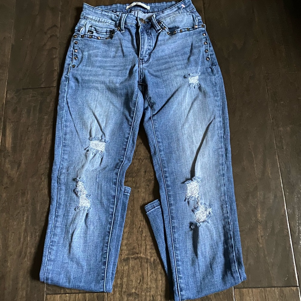 Ripped Kancan studded skinnies